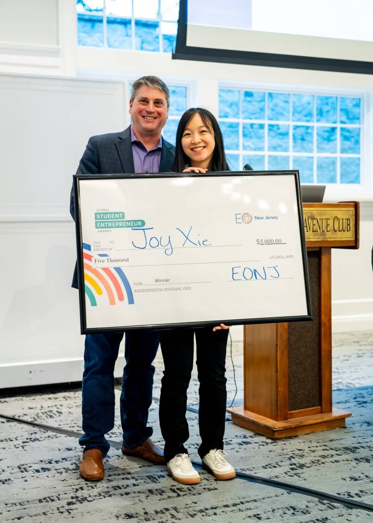 Joy Xie, EO NJ GSEA winner, with Steve Schneider